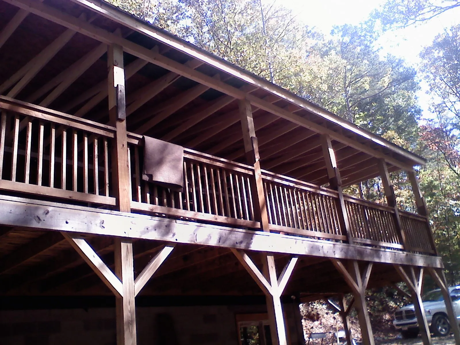 Timber framing under a new elevated porch and deck — Roof Leak Repair in Lake Forest by Roofing Brothers